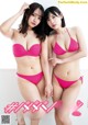 Two young women in pink bikinis posing for the camera.